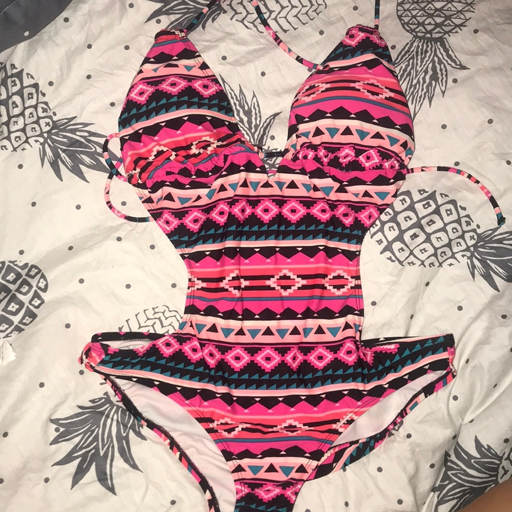 Cute tribal looking backless swimsuit.